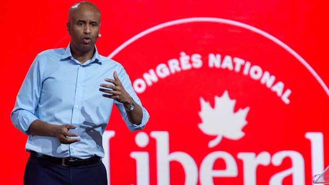 Immigration minister says he was target of racial profiling, calls on Liberals to fight racism