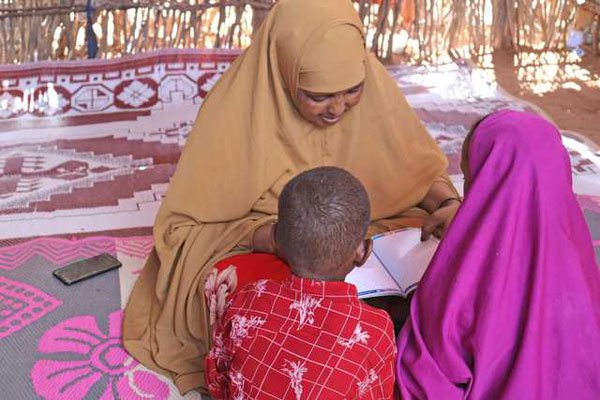Women refugees fostering children at Dadaab Camp